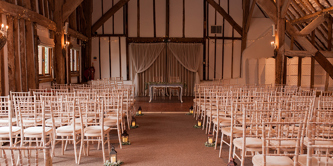 Fitzleroi Barn set up for a ceremony