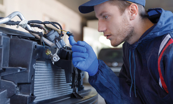 Mechanic inspecting a car
