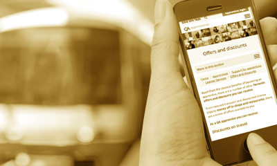 Viewing offers and discounts on a mobile before a bus comes