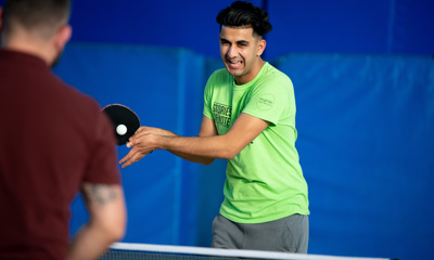 Young boy playing table tennis