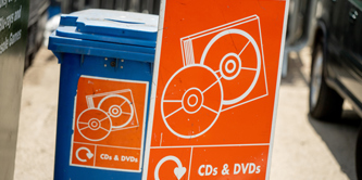 Media bin and sign at a recycling centre