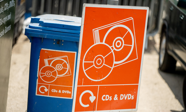 Media bin and sign at a recycling centre