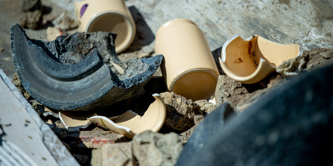 Rubble and ceramics in a container at a recycling centre.