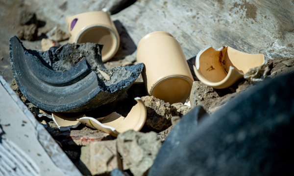 Rubble and ceramics in a container at a recycling centre.