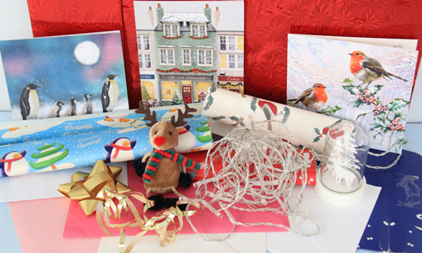 Christmas wrapping, cards, bows and decorations.