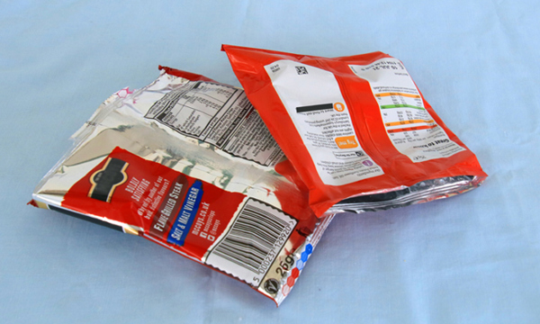 2 empty crisp packets.