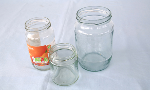 3 empty jam jars.
