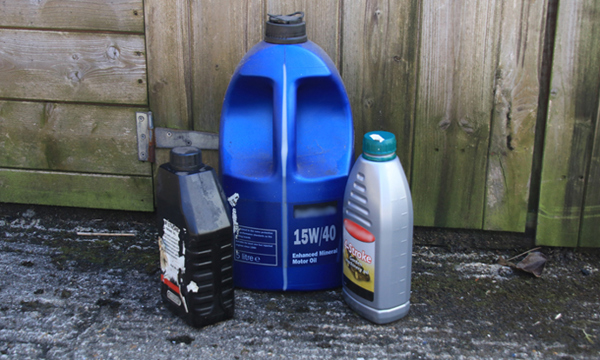 3 bottles of motor oil.