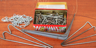 Items of scrap metal on a table.