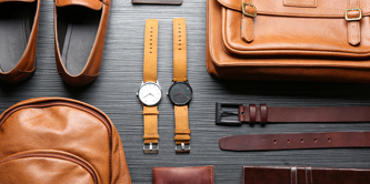 Various leather articles, including a belt, wallet, bags and watch straps.