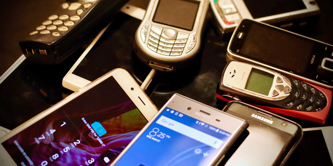 A pile of old mobile phones.