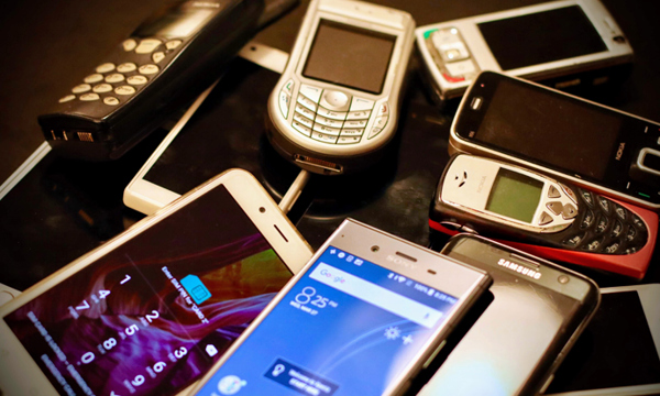 A pile of old mobile phones.