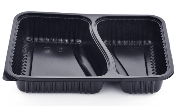 A black plastic convenience meal tray.