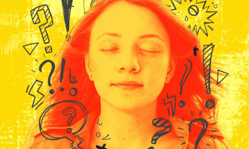 Young woman with eyes closed