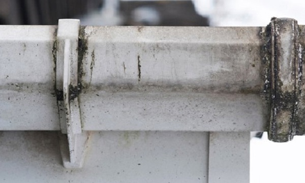 A dirty gutter pipe