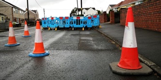 Traffic cones and barriers in a road