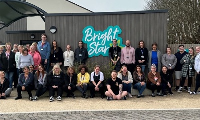 Bright Star staff team picture outside the children's home