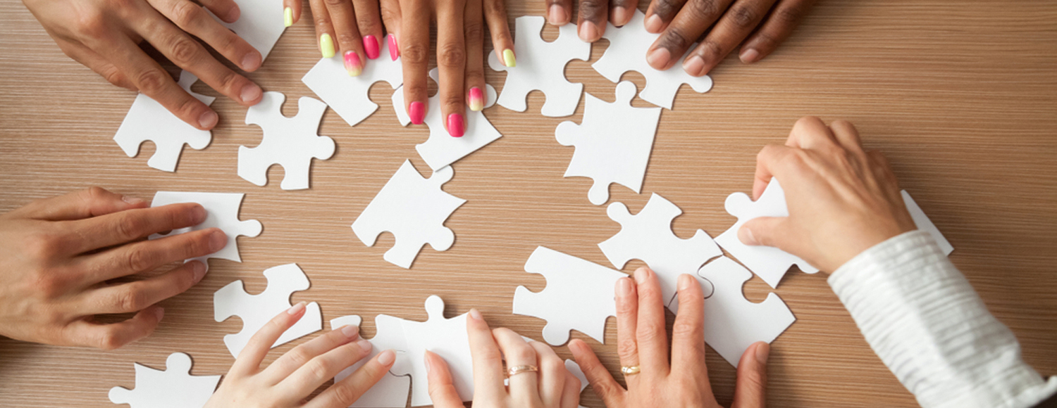 People doing a jigsaw