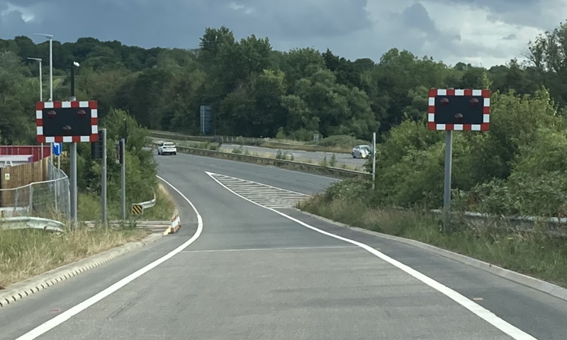 a view of the wig wags on the A24 slip road