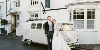 Bride and groom outside Angel Inn
