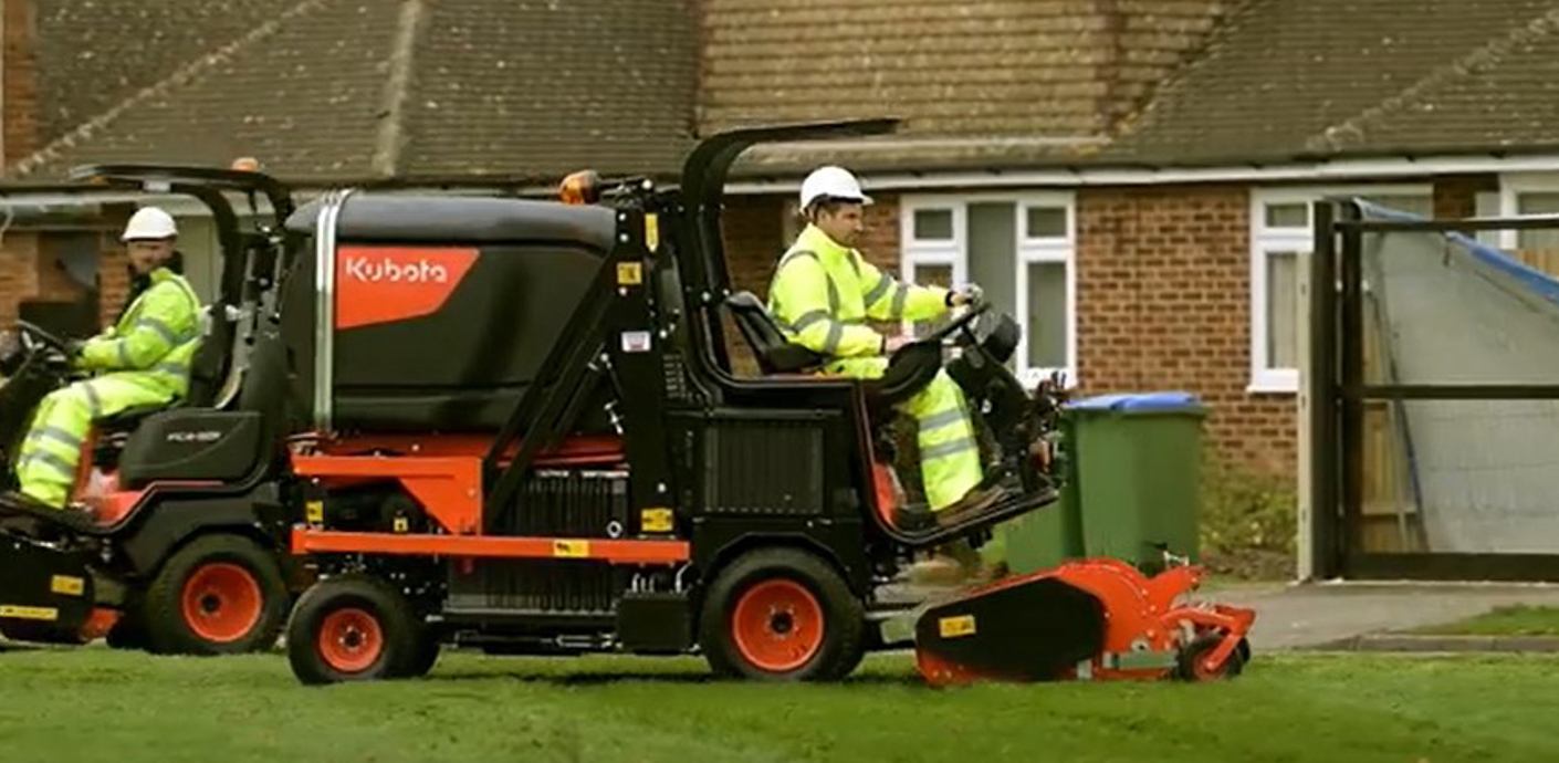 Two men on mowers
