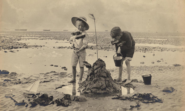 Archive photo of children playing on the beach