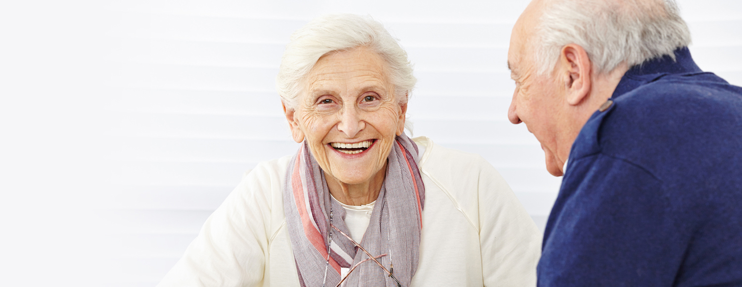 Older man and woman having a conversation