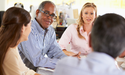 People talking around a table