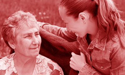 Young person helping a pensioner