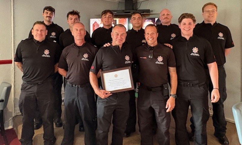 Watch Manager Danny Flynn with colleagues at his retirement presentation