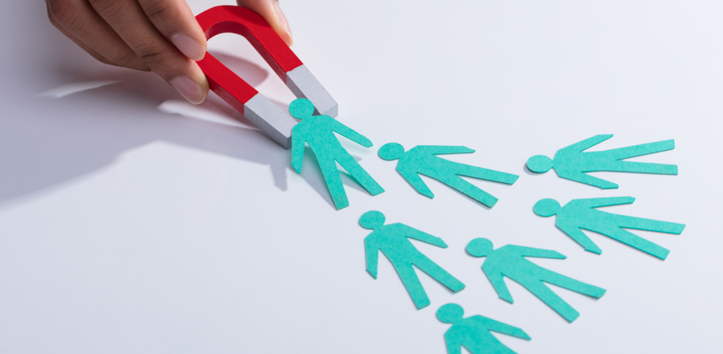 nojs Picture of a magnet and 7 cut out people